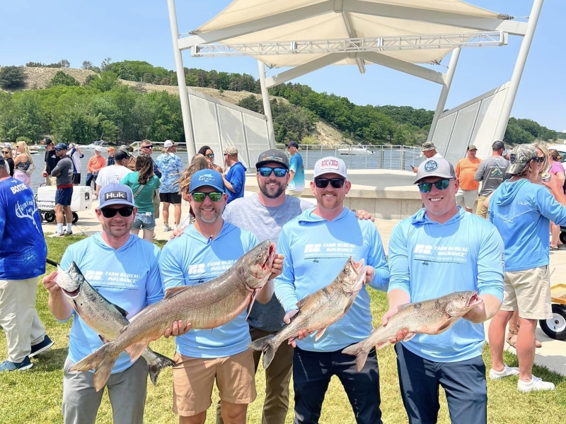 Team holding Fish