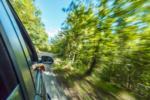 Car driving down the road
